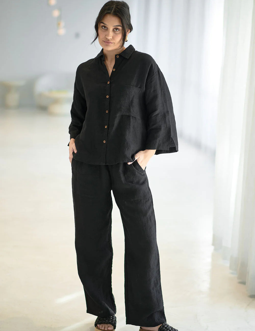eadie-lifestyle-fundamental-linen-shirt-wide-leg-linen-pant-black-S23A_0010-web_jpg_d199ad8e-2fdf-4824-b9cb-ba22a1fe3b2f.webp